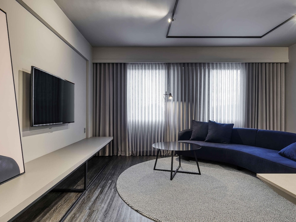 Suite Executive con una cama doble del hotel Caesar Business Belo Horizonte Belvedere. Foto 1