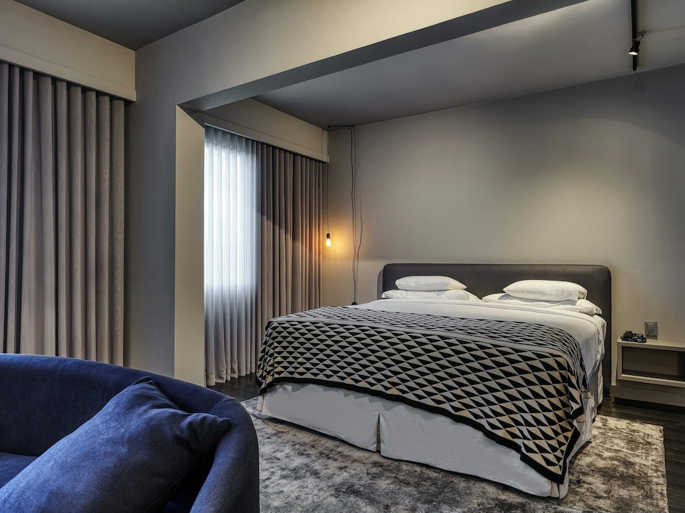 Suite Executive con una cama doble del hotel Caesar Business Belo Horizonte Belvedere. Foto 5