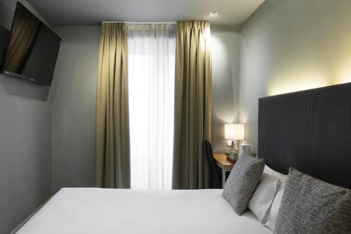 Habitación doble del hotel Petit Palace Tres Cruces. Foto 2