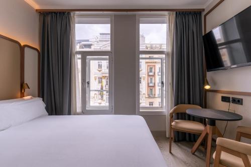 Habitación Triple del hotel Petit Palace Alcala