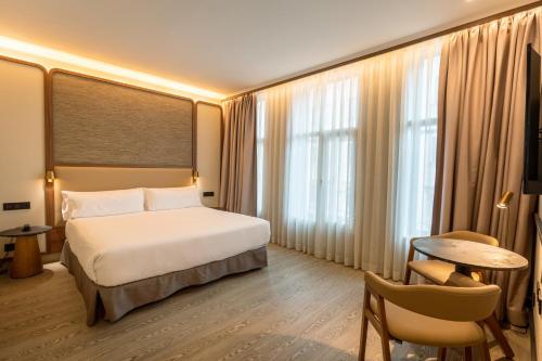 Habitación Doble Superior del hotel Petit Palace Alcala. Foto 6