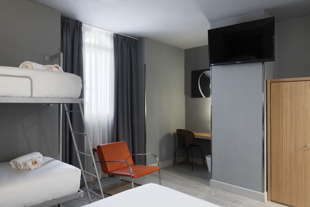 Habitación Cuádruple del hotel Petit Palace Alcala. Foto 2