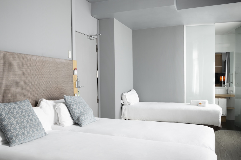 Habitación Triple del hotel Petit Palace Alcala