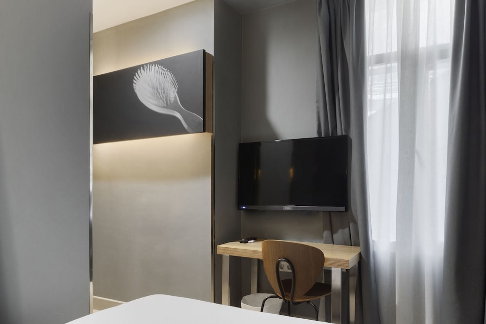 Habitación básica doble del hotel Petit Palace Alcala. Foto 1