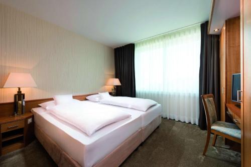 Suite Clásica del hotel Maritim Stuttgart. Foto 3