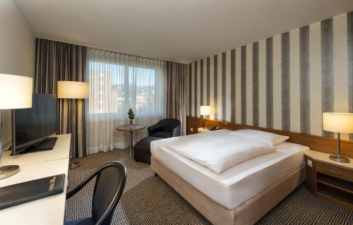 Habitación Familiar Comfort Plus del hotel Maritim Stuttgart. Foto 2