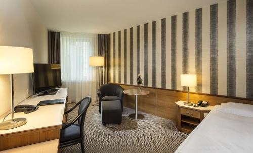 Habitación Familiar Comfort Plus del hotel Maritim Stuttgart. Foto 3