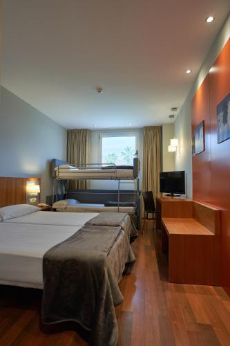 Habitación Cuádruple Clásica del hotel Ag Express Elche. Foto 1