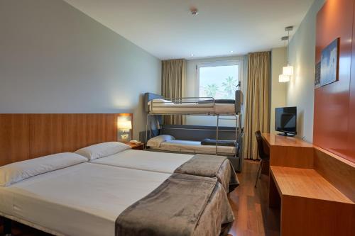 Habitación Cuádruple Clásica del hotel Ag Express Elche. Foto 2