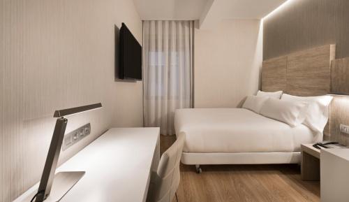 Habitación Individual Estándar del hotel Nh Madrid Chamberí. Foto 2
