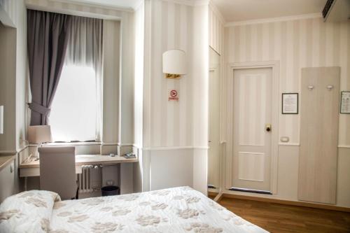 Habitación Doble del hotel Flora. Foto 1