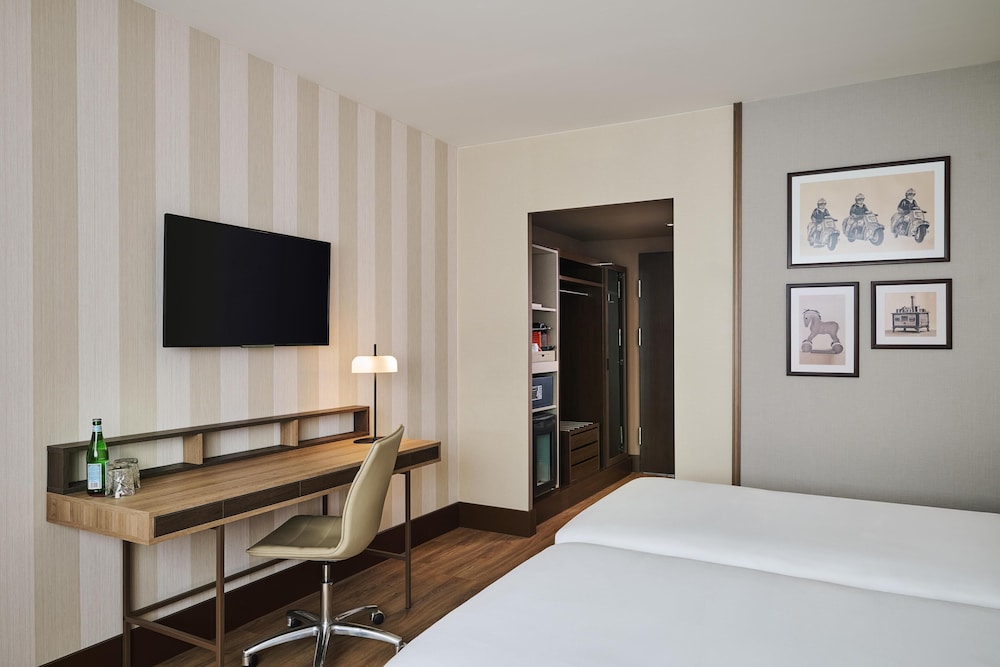 Habitación superior (Extra Bed 2 adults + 1 child) del hotel Nh Collection Nürnberg City. Foto 3