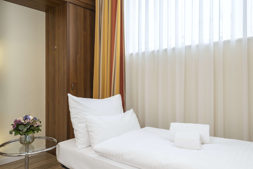 Habitación familiar del hotel NH Wien Belvedere. Foto 4