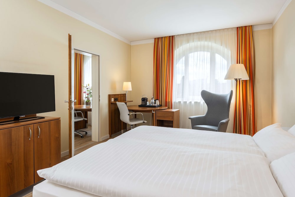 Habitación familiar del hotel NH Wien Belvedere. Foto 6