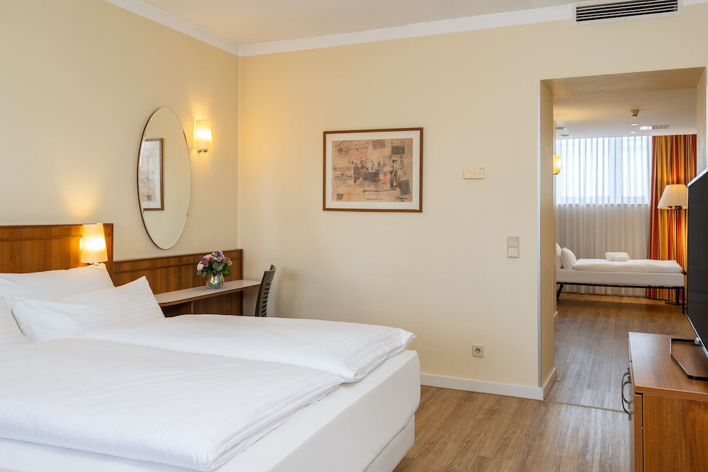 Habitación triple familiar del hotel NH Wien Belvedere