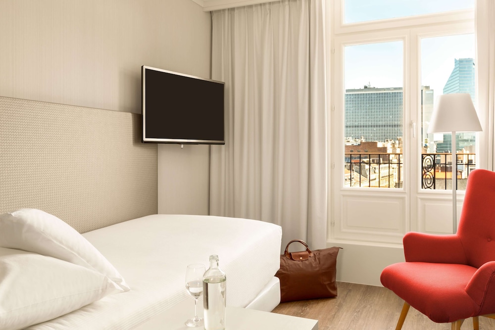 Habitación Individual Estándar del hotel NH Collection Brussels Centre. Foto 1