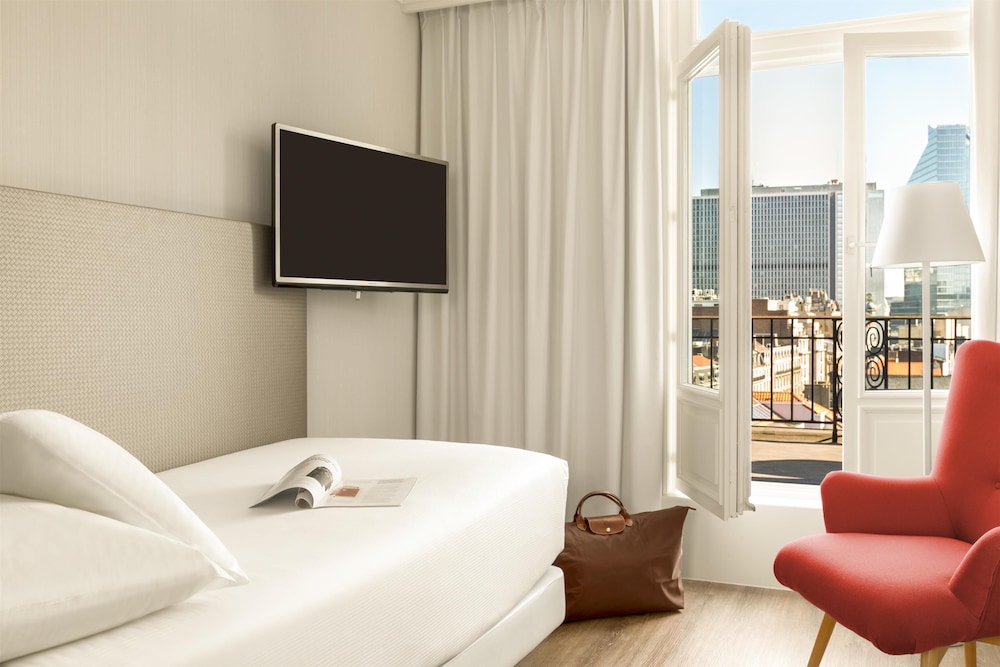 Habitación Individual Estándar del hotel NH Collection Brussels Centre. Foto 4