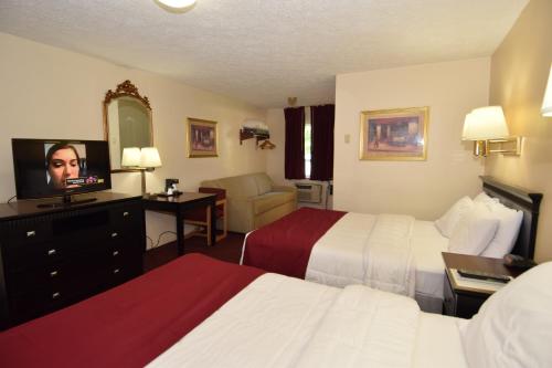 Habitación Deluxe - 1 cama grande del hotel Knights Inn Oswego East. Foto 1