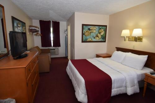 Habitación con cama grande - Fumadores del hotel Knights Inn Oswego East. Foto 2