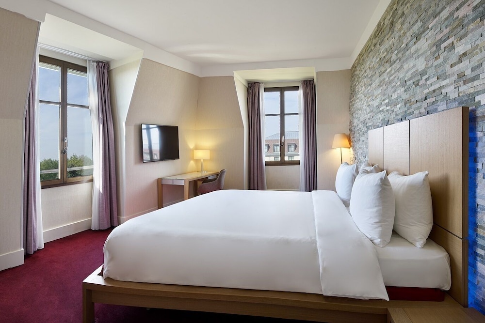 Suite Signature (living area) del hotel Crowne Plaza Paris Marne-la-Vallee by IHG. Foto 6