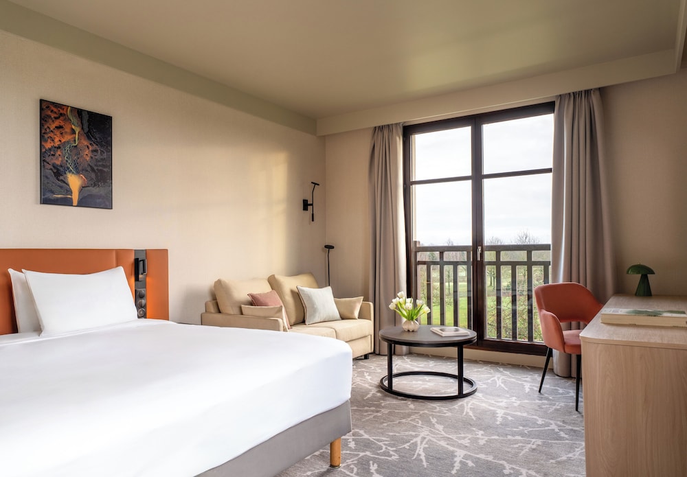 Habitación Premium, 1 cama de matrimonio grande con sofá cama del hotel Crowne Plaza Paris Marne-la-Vallee by IHG. Foto 12