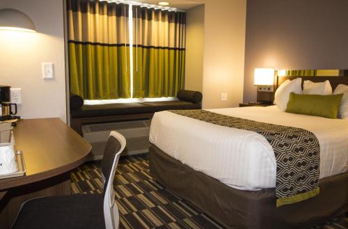 Habitación - No fumadores - Cama grande del hotel Microtel Inn & Suites by Wyndham Victor/Rochester