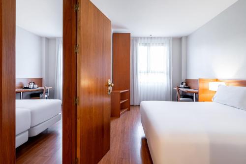 Habitación Doble Familiar del hotel Exe Pozuelo. Foto 1