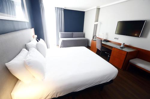Habitación Familiar del hotel Travelodge Madrid Coslada Aeropuerto. Foto 9