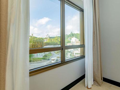 Apartamento Standard con dos camas individuales del hotel Mercure Florianópolis. Foto 8