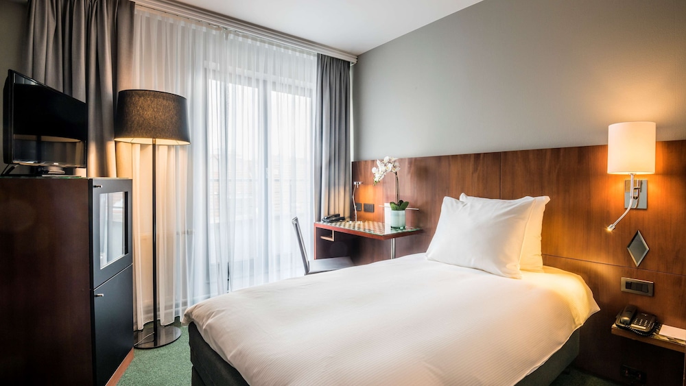 Habitación individual estándar del hotel Nh Brussels Eu Berlaymont. Foto 1