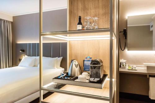 Suite Junior con cama supletoria del hotel Nh Brussels Airport. Foto 7