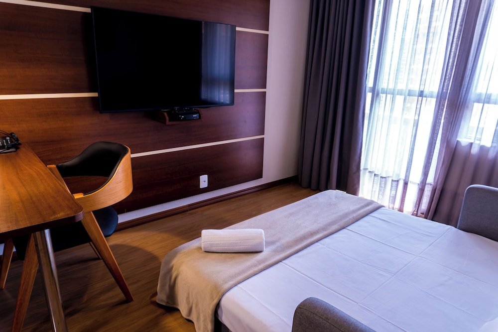Habitación Superior con 1 cama doble y sofá cama del hotel Mercure Curitiba Golden. Foto 6