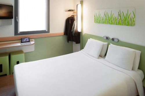 Habitación Doble del hotel Ibis Budget Brussels South Ruisbroek. Foto 3