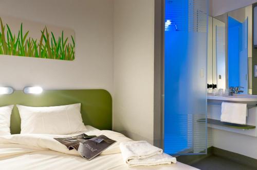 Habitación Doble del hotel Ibis Budget Brussels South Ruisbroek. Foto 4