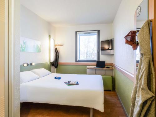 Habitación Doble del hotel Ibis Budget Brussels South Ruisbroek. Foto 7