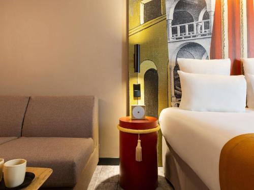 Habitación Doble Privilege con sofá cama del hotel Mercure Paris Alesia