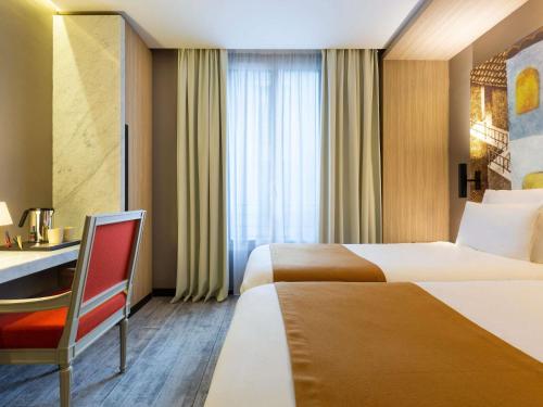 Habitación Twin Estándar - 2 camas del hotel Mercure Paris Alesia. Foto 2