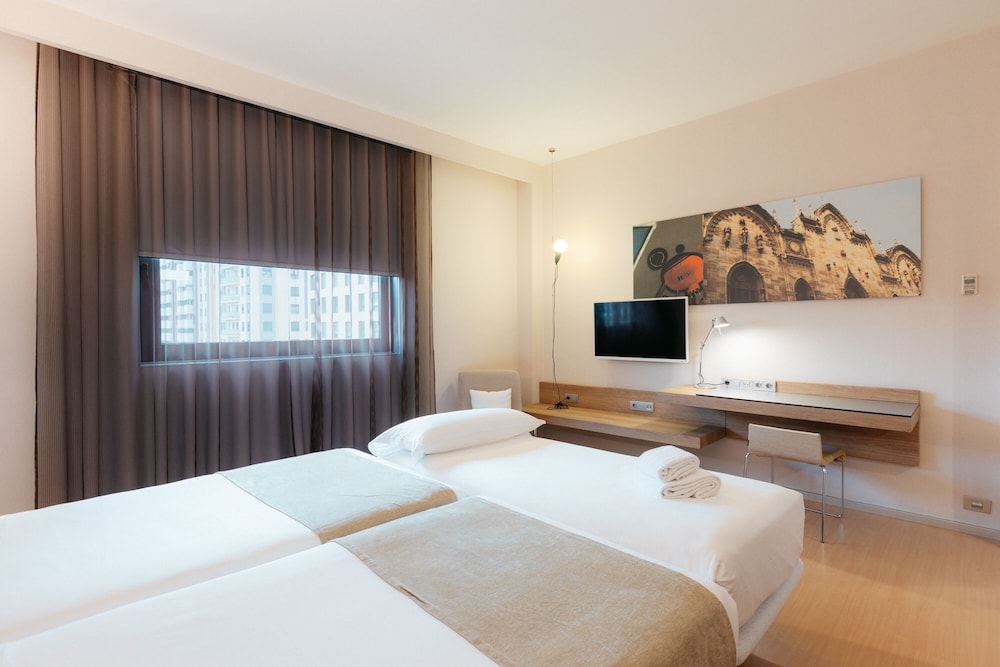 Habitación Deluxe (with extra bed) del hotel Barcelo Valencia