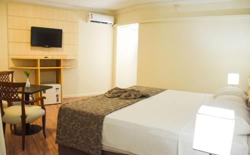 Habitación Estándar - Cama extragrande del hotel Golden Park Internacional Foz and Convenções. Foto 3