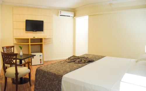 Habitación Estándar - Cama extragrande del hotel Golden Park Internacional Foz and Convenções. Foto 7