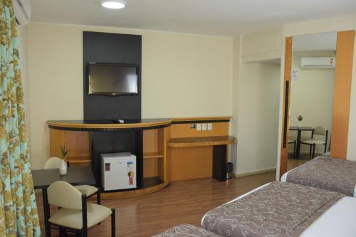 Habitación Familiar Estándar del hotel Golden Park Internacional Foz and Convenções. Foto 2