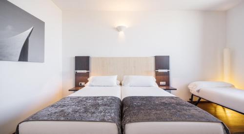 Habitación Triple del hotel Ilunion Aqua 4. Foto 4