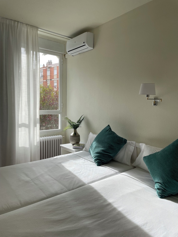 Triple room With Three Single Beds del hotel La Mota by Punta25. Foto 1