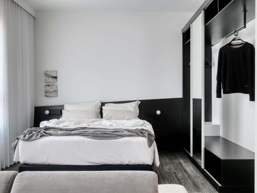 Habitación Superior con 1 cama grande y 1 sofá cama del hotel Mercure Belo Horizonte Lourdes
