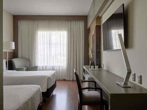 Habitación Doble Superior - 2 camas individuales del hotel Mercure Belo Horizonte Lourdes. Foto 1