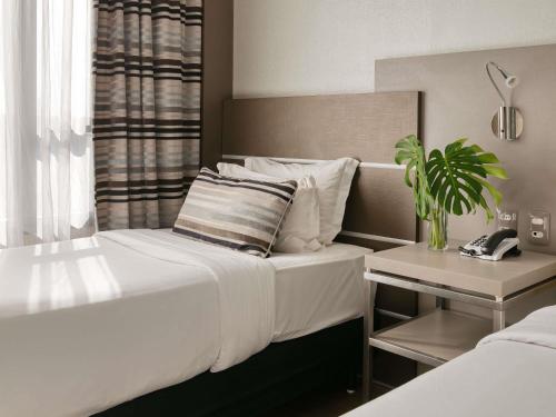 Habitación Doble Superior - 2 camas individuales del hotel Mercure Belo Horizonte Lourdes. Foto 2