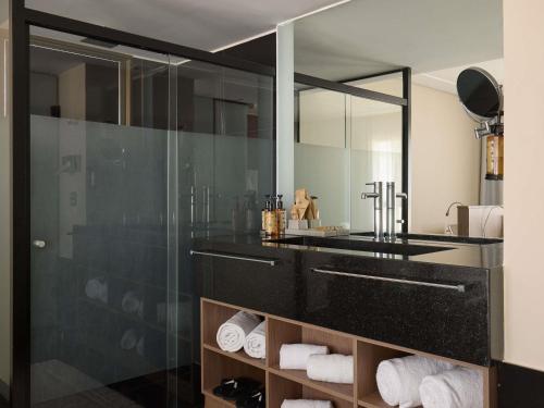 Suite Deluxe con 1 cama grande del hotel Mercure Belo Horizonte Lourdes. Foto 2