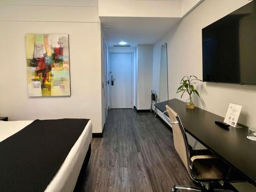 Habitación Estándar con cama doble - Adaptada para personas con discapacidad del hotel Mercure Belo Horizonte Lourdes. Foto 1