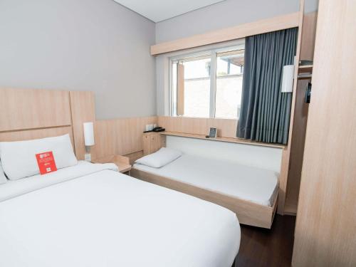 Habitación Doble con futón adicional para niño del hotel Ibis Medellin