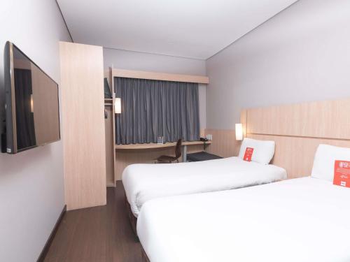 Habitación Doble - 2 camas del hotel Ibis Medellin. Foto 6